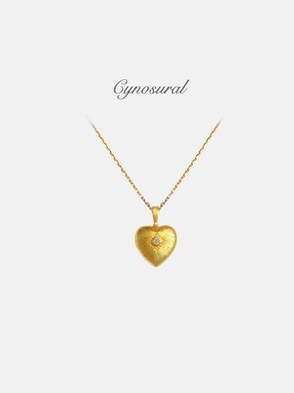 Handmade brushed gold heart-shaped necklace